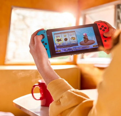 Consola Nintendo Switch Neon + Mario Kart 8 Deluxe